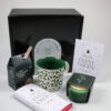 Kerst cadeaupakket - Mok, onderzetter, chocolademelk, chocoladereep & een kaars