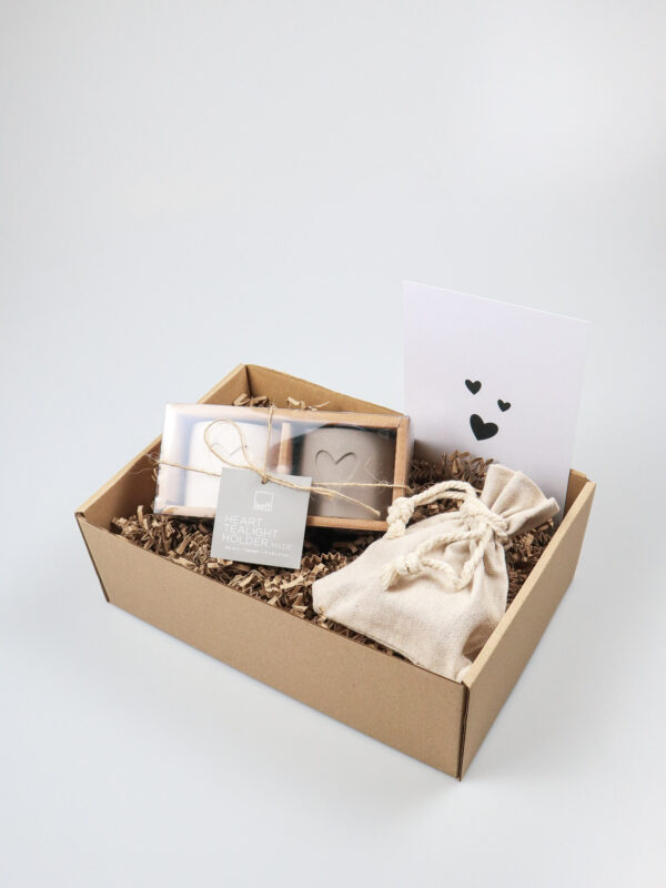 Cadeaupakket met waxinelichthouders en waxinelichtjes