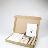 Brievenbus cadeau Veel liefs – geurzakje, swirl kaarsen & deco frame
